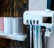 Автоматический диспенсер для зубной пасты и щеток Toothbrush Sterilizer 3 в 1